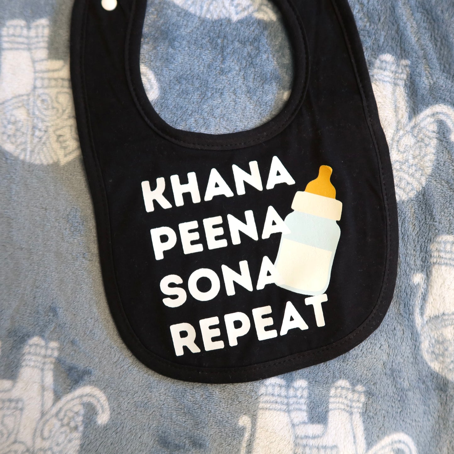 Khana Peena Sona Repeat Baby Bib