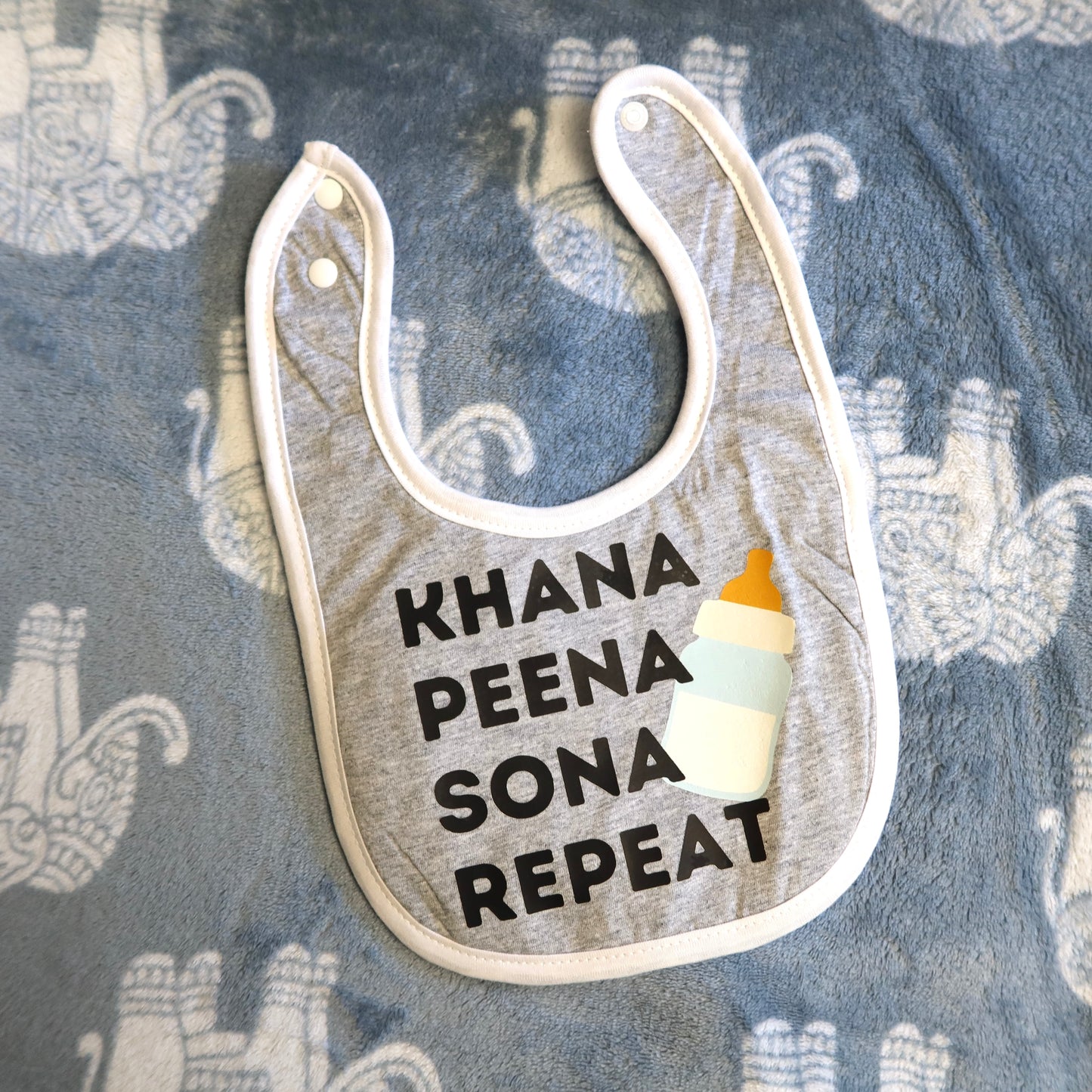 Khana Peena Sona Repeat Baby Bib