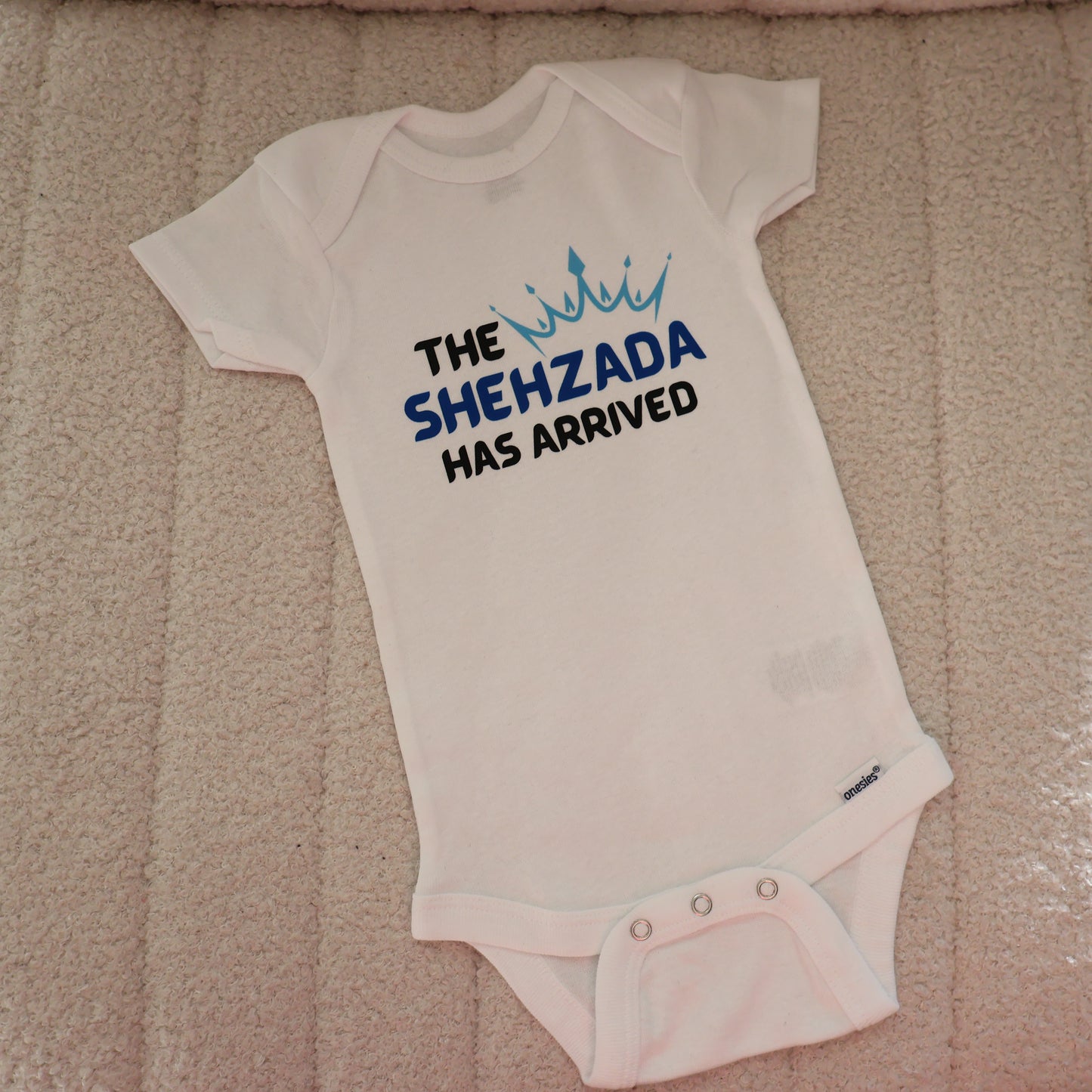 The Shehzada Has Arrived Short Sleeve Onesie – White (3–6M)