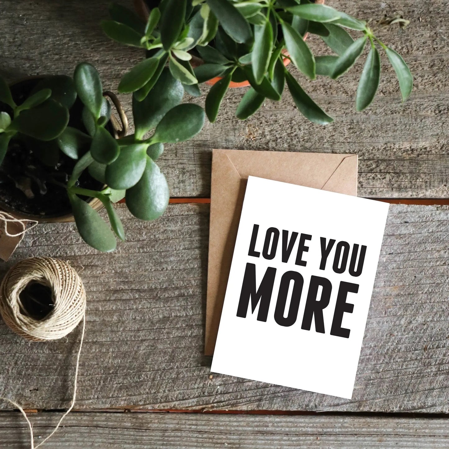 "Love You More" Greeting Card
