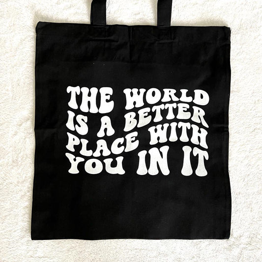 "The World is a Better Place with You in It" Tote Bag